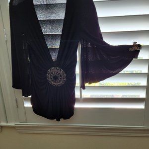 Black top with heavy bezel detail